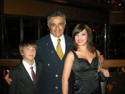 Aaron and Linnea with the Captain of the Carnival Glory. This was a party for "previous cruisers".