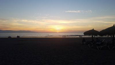 Here's our obligatory sunset in paradise photo.   Fun first day exploring.