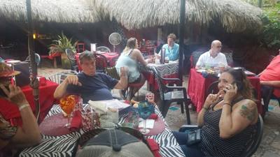 Marlin and I sitting here having margaritas listening to these two Realtors talk on the phone...