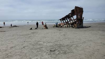 Interesting stop.  This beach has a ship under it with parts poking out.  Oh yeah, it's like 52 degrees and Oregonians a