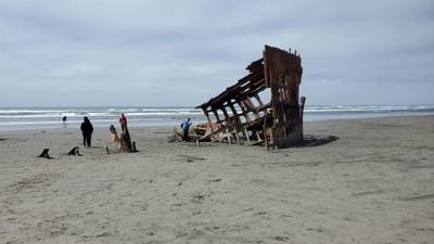 Interesting stop.  This beach has a ship under it with parts poking out.  Oh yeah, it's like 52 degrees and Oregonians a