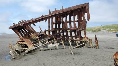 Interesting stop.  This beach has a ship under it with parts poking out.  Oh yeah, it's like 52 degrees and Oregonians a