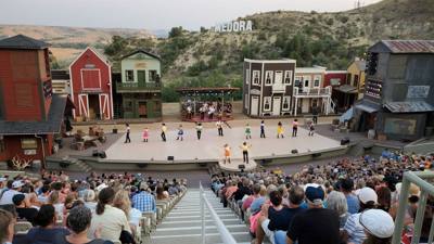 Medora Musical tonight.  Gotta love the backdrop behind all of this.  What a fantastic venue!  Avery is having fun.