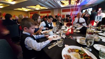 Julie, Linnea, Avery and I had a great time at the Oscar Mike Ball in Chicago last night having it with our buddy Tim.  