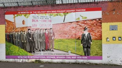 Black Taxi Tours.  If you're not familiar with Irish history there's been a conflict between the Catholics and Protestan