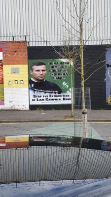 Black Taxi Tours.  If you're not familiar with Irish history there's been a conflict between the Catholics and Protestan