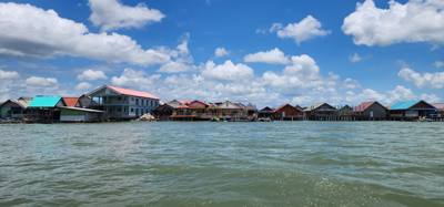 Second stop on the Phuket Island hopping tour was Koh Panyee village.  We got off of our larger boat for a smaller more 