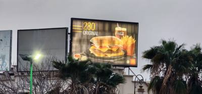 You saw it here folks.  The billboard says it all.  You too can have a hamburger meal at McDo's (that's what they call i