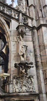 I can't accurately explain the awe when you walk out of the subway at Duomo di Milano.  It's ornate and massive and when