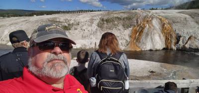 A lot of vibrant colors in some of those pools.  Lots to see here.  I couldn't get Avery to go pet a bison.  He must be 