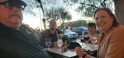Sitting outside for sunset drinks before dinner.  It's 70 degrees.  Tomorrow we go home where outside air hurts.