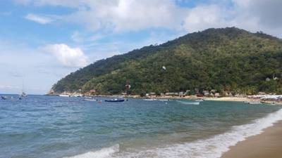 Majahuitas and Yelapa.  Neither of these places is available by road.  You have to take a boat.  Yelapa had a nice water